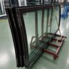 Curved sliding door leaves, glazed and assembled