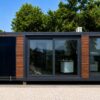 The converted container site office with full-height vacuum glazing