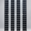 Upright solar insulating glass panel with transparent spaces between photovoltaic cells